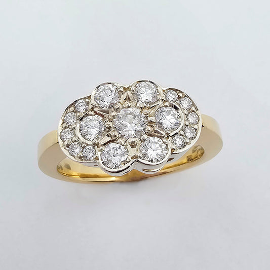 9ct yellow and white gold cluster ring featuring a star burst pattern of textural bead set brilliant round diamonds held by a solid gold band.