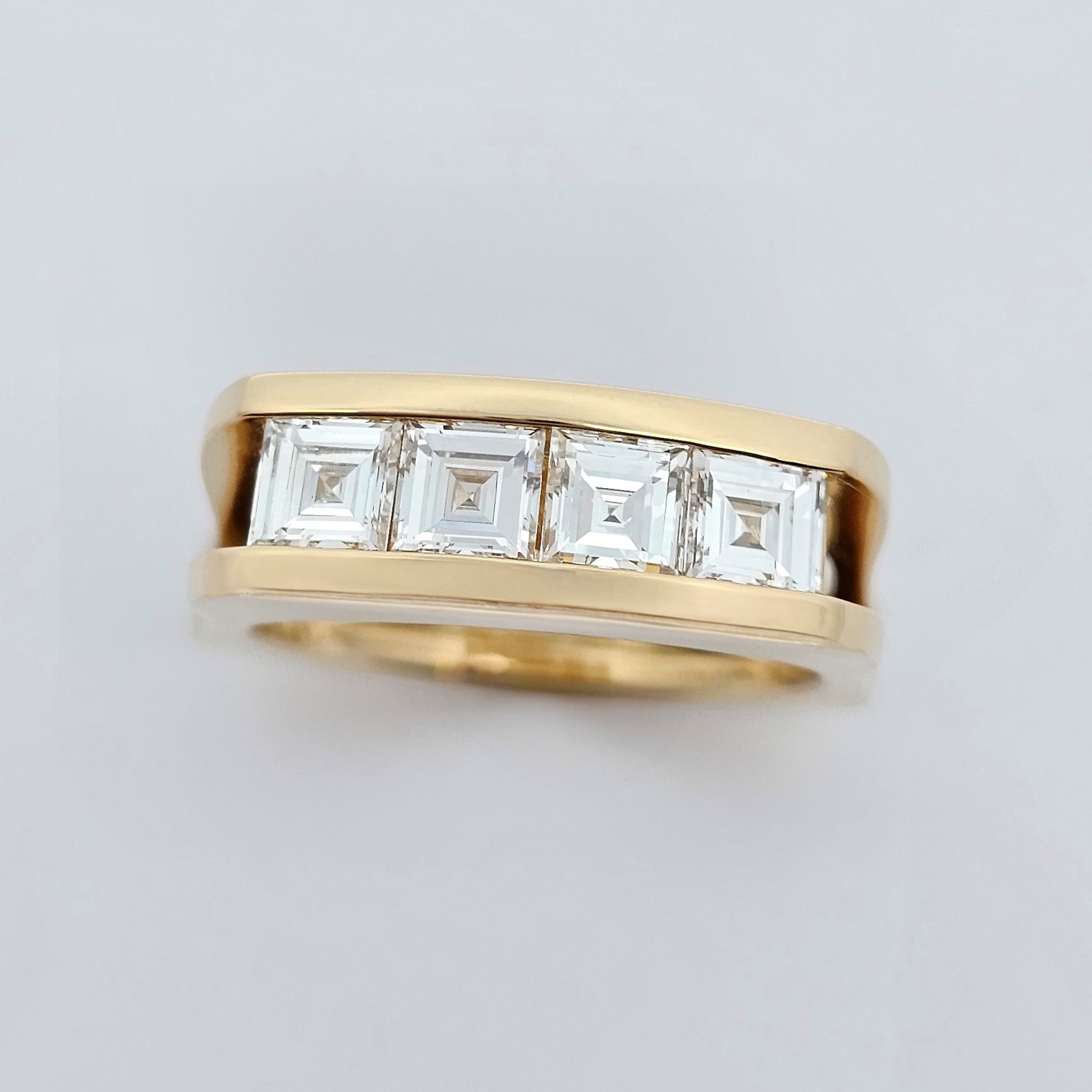 yellow gold carre cut diamond channel set ring