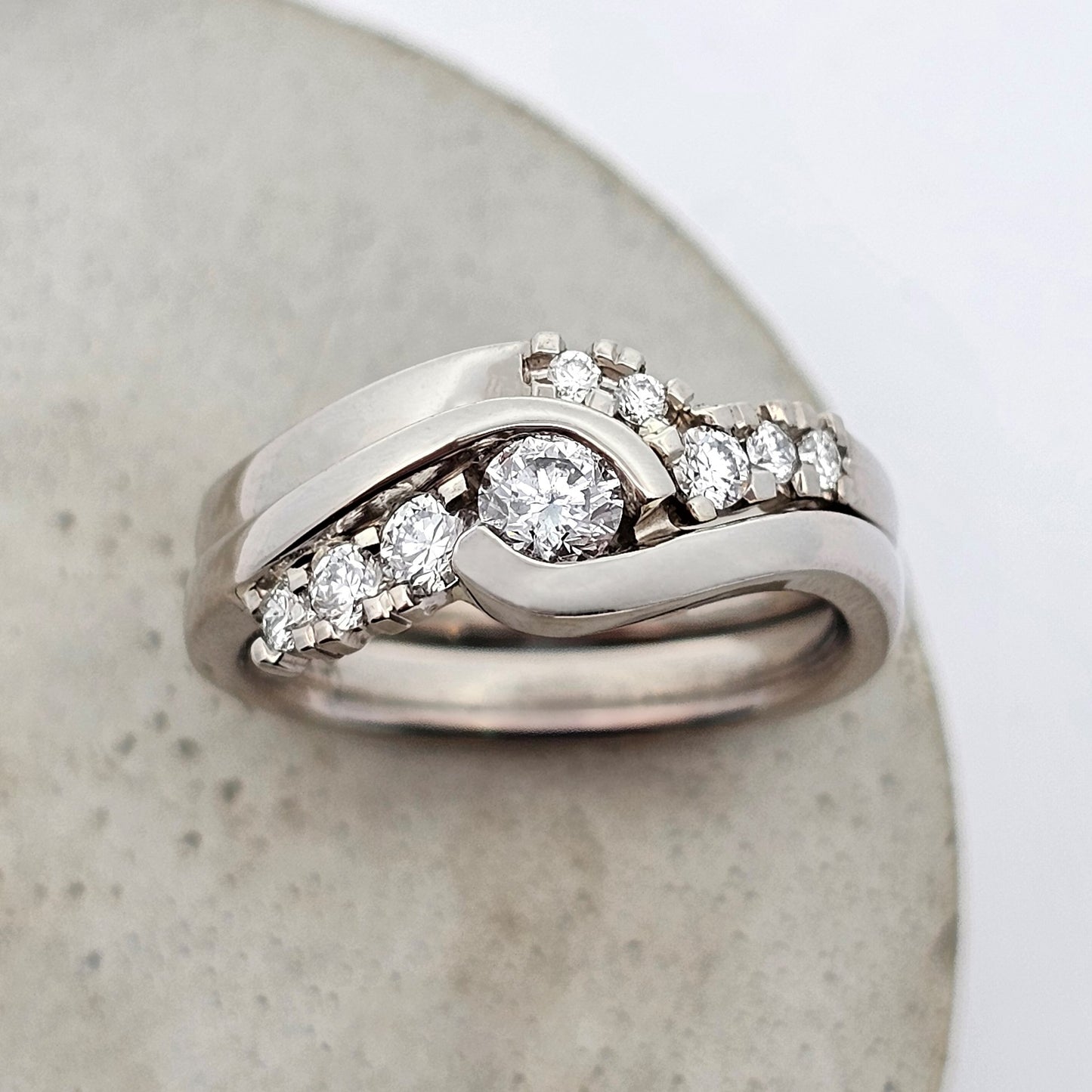 white gold shaped fitted diamond engagement and wedding ring set