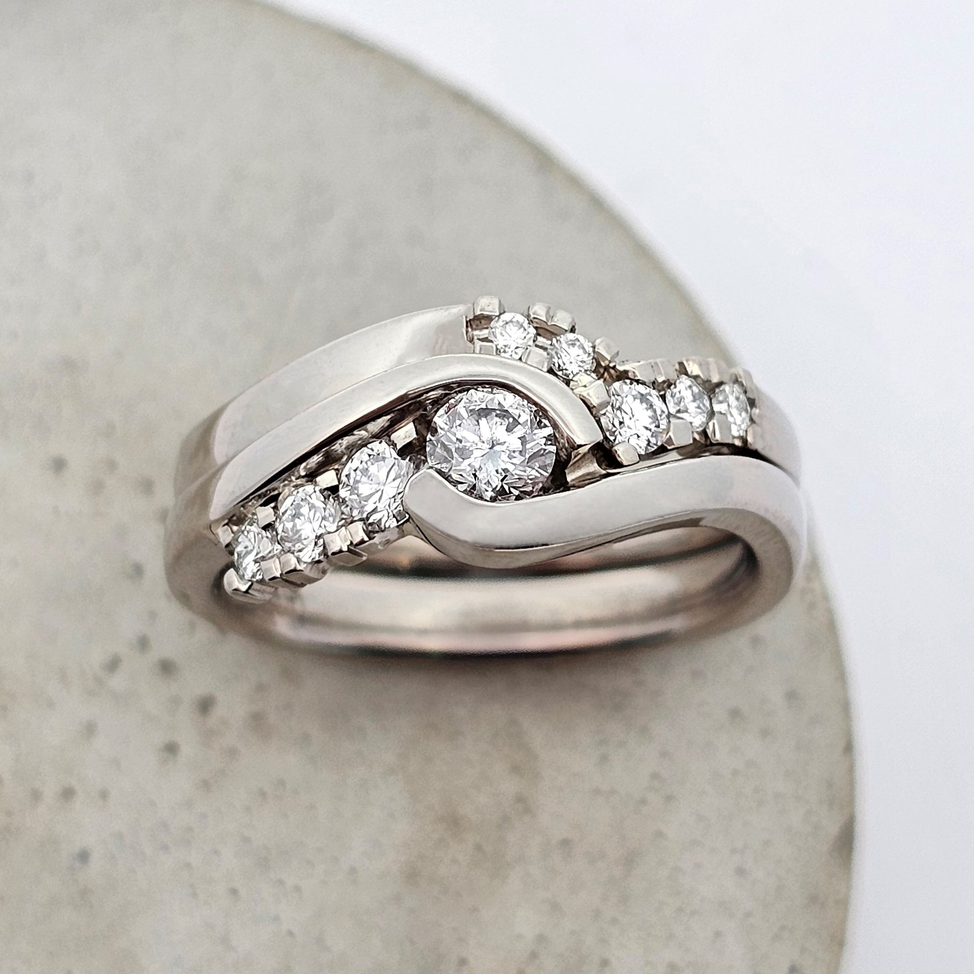 white gold shaped fitted diamond engagement and wedding ring set