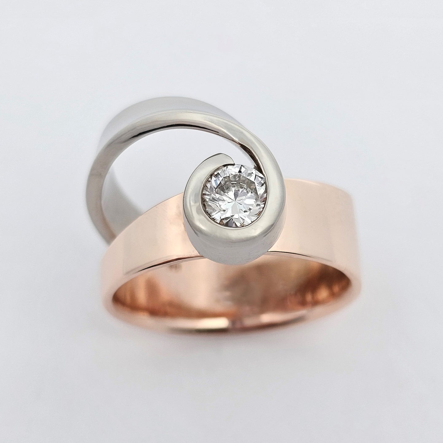 white and rose gold unique half carat diamond ring