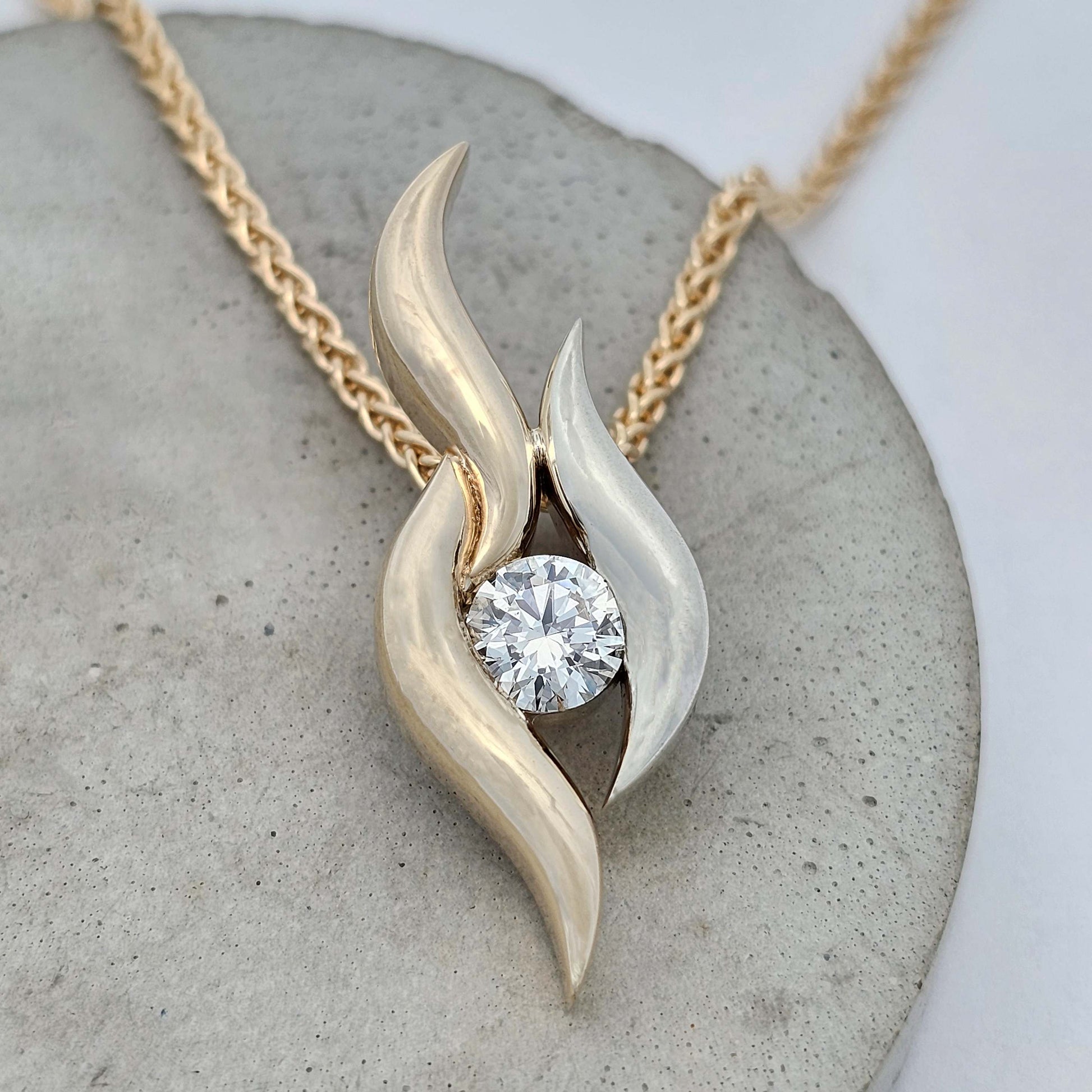 9ct yellow and white gold half carat diamond pendant