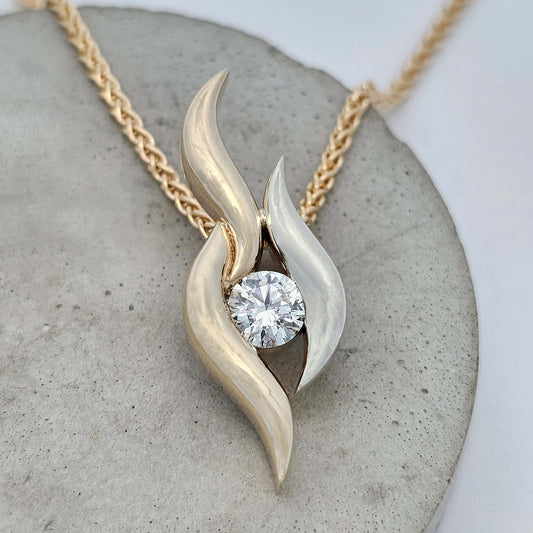 9ct yellow and white gold half carat diamond pendant