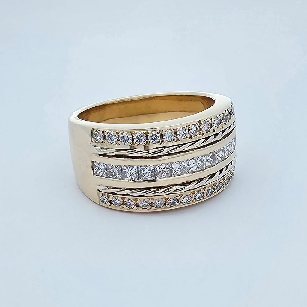 9ct yellow and white gold wide ladies dress ring, featuring two rows of bead set round white diamonds, one row of channel set princess cut diamonds and two rows of twisted round gold wire.