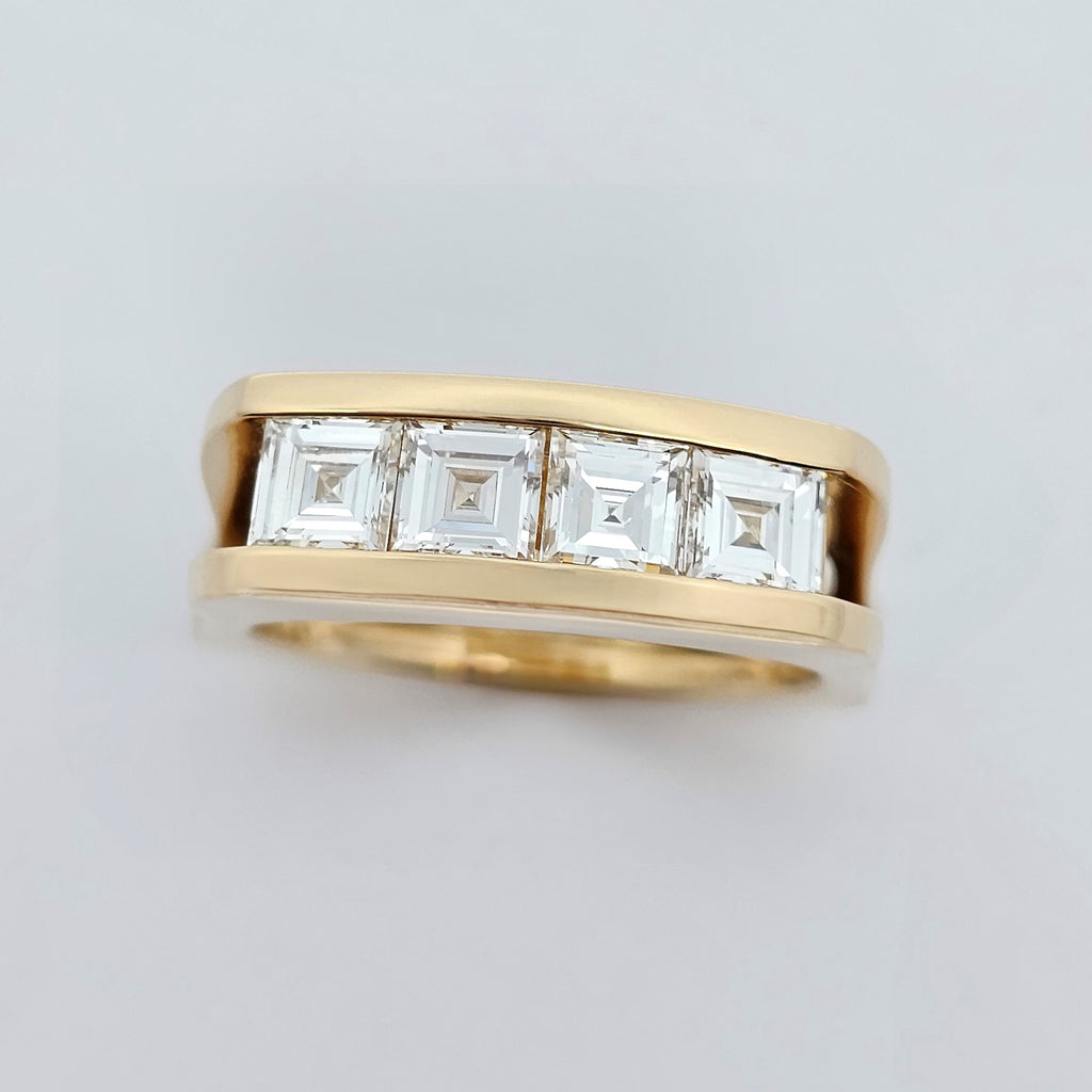 yellow gold carre cut diamond channel set ring 