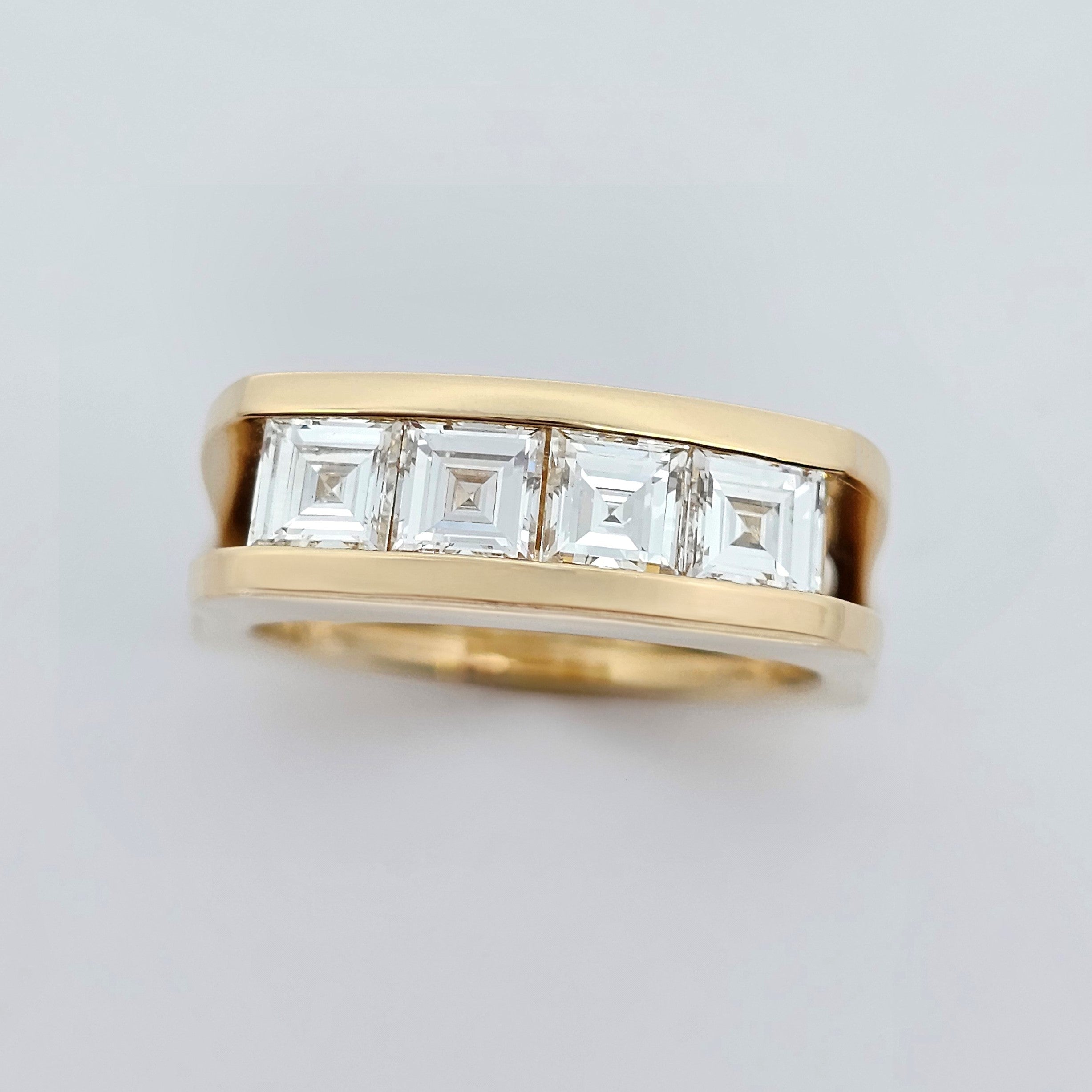 yellow gold carre cut diamond channel set ring 