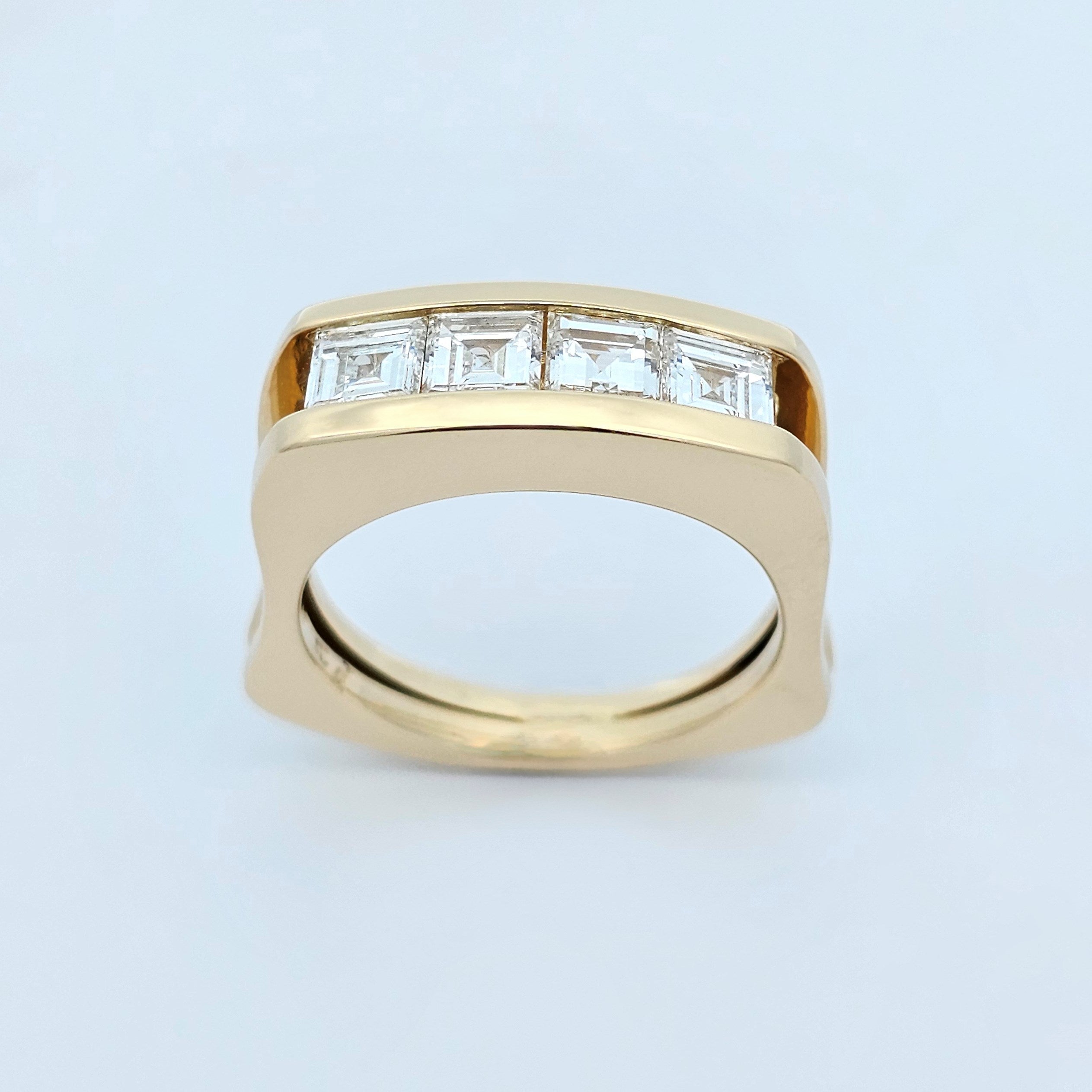 yellow gold carre cut diamond channel set ring 