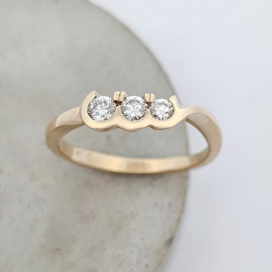 yellow gold three stone diamond ring