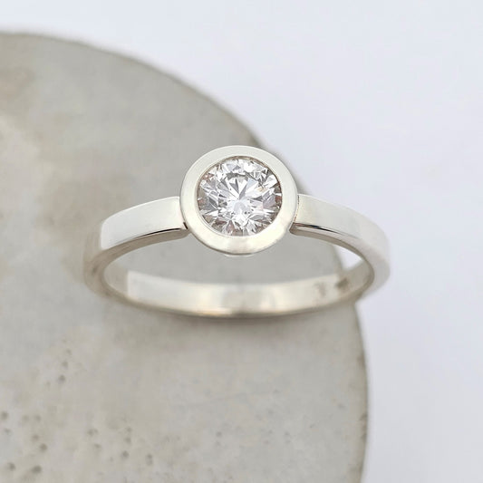 white gold round brilliant cut diamond solitaire engagement ring