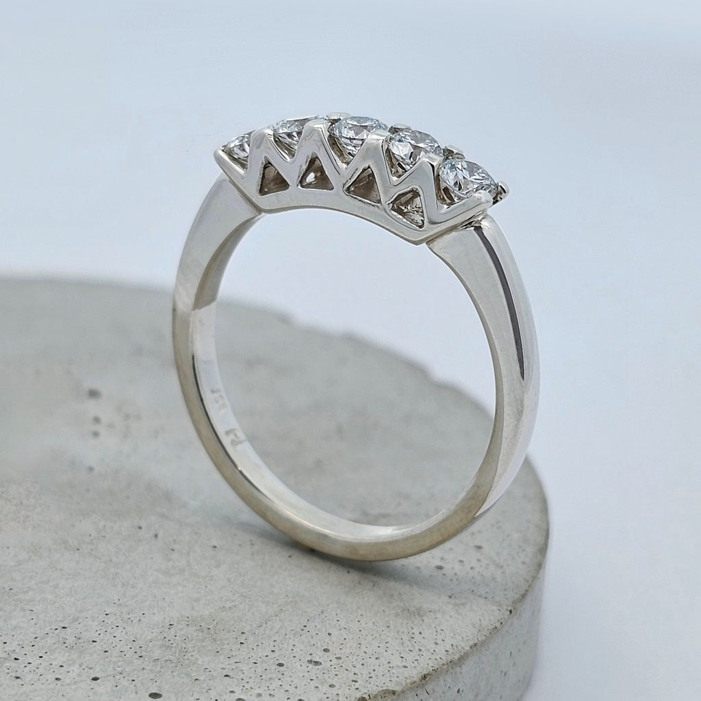 9ct white gold modern bridge style diamond ring