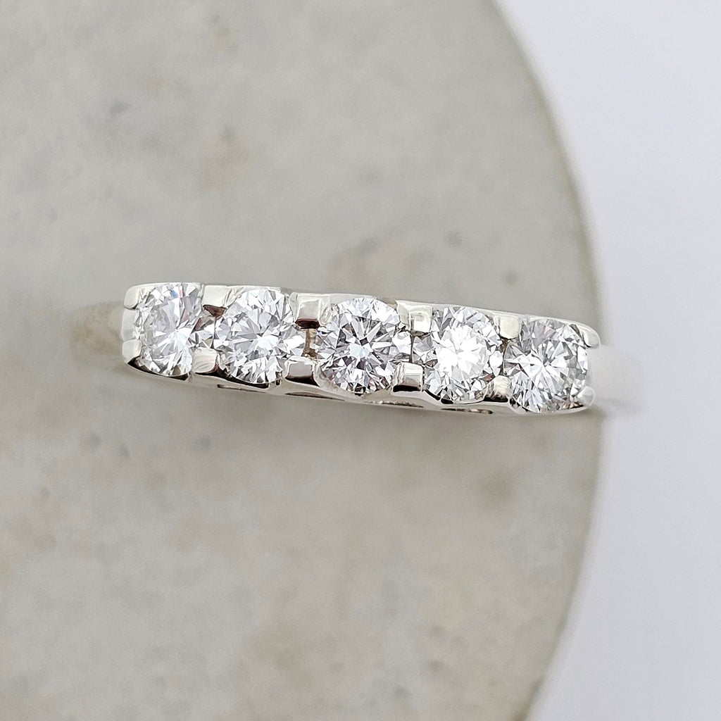 9ct white gold modern bridge style diamond ring