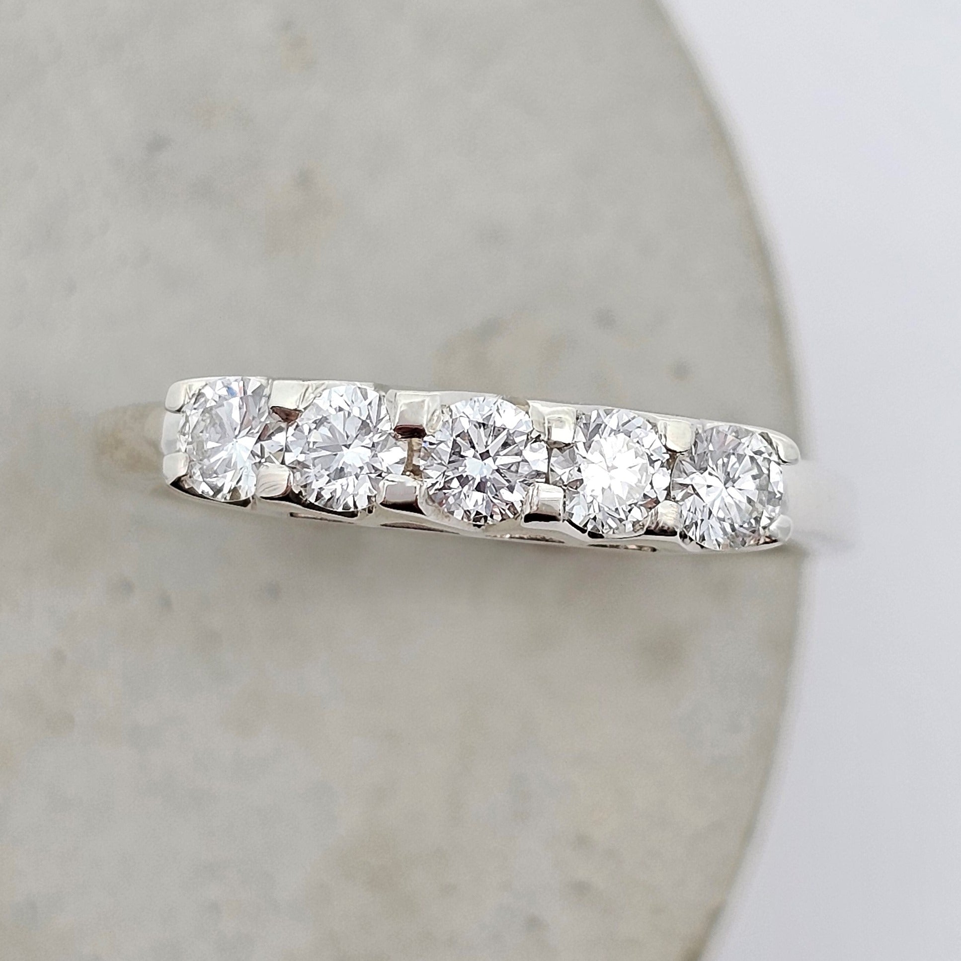 9ct white gold modern bridge style diamond ring