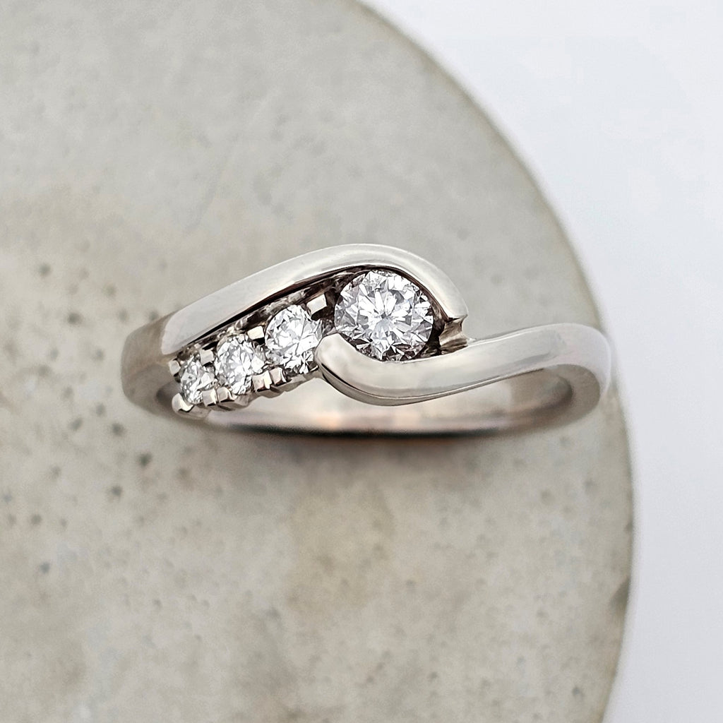 white gold unique low profile diamond engagement ring