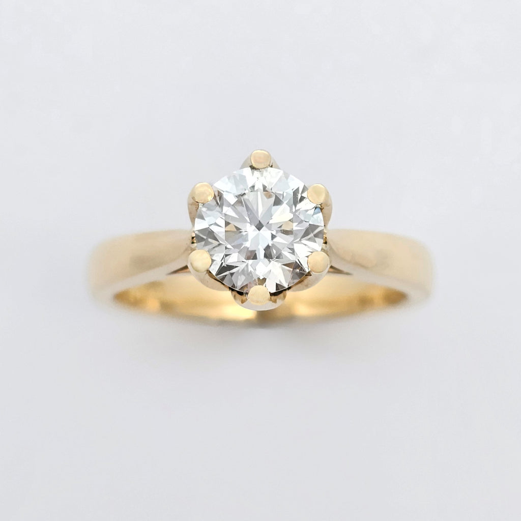 yellow gold round brilliant cut diamond claw-set solitaire engagement ring