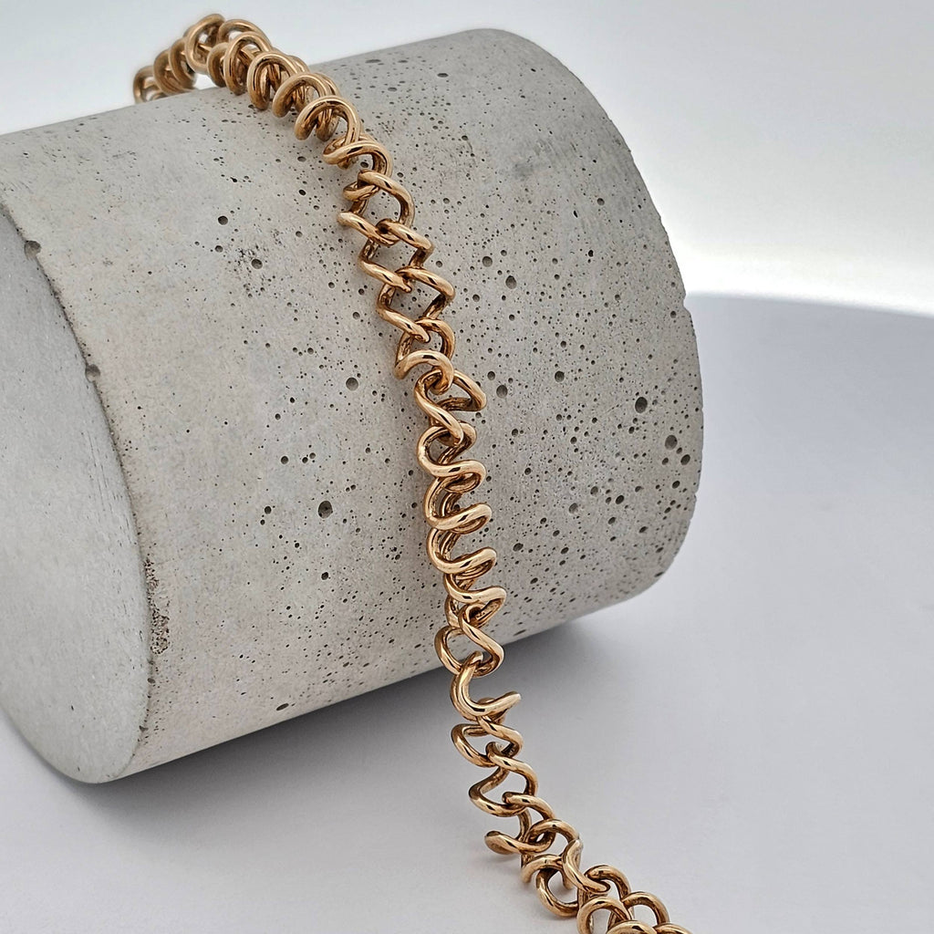 yellow gold unique spring link bracelet 