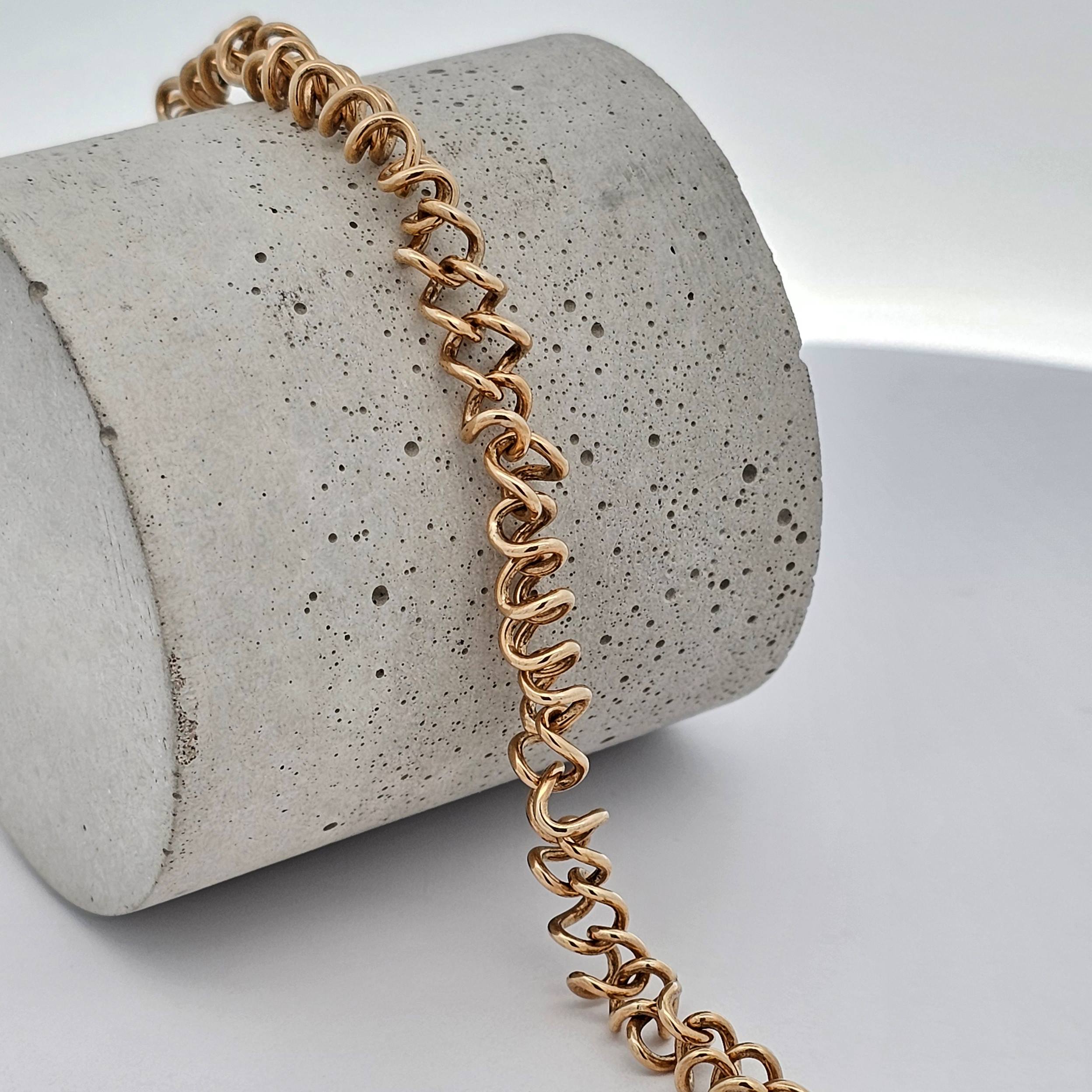 yellow gold unique spring link bracelet 