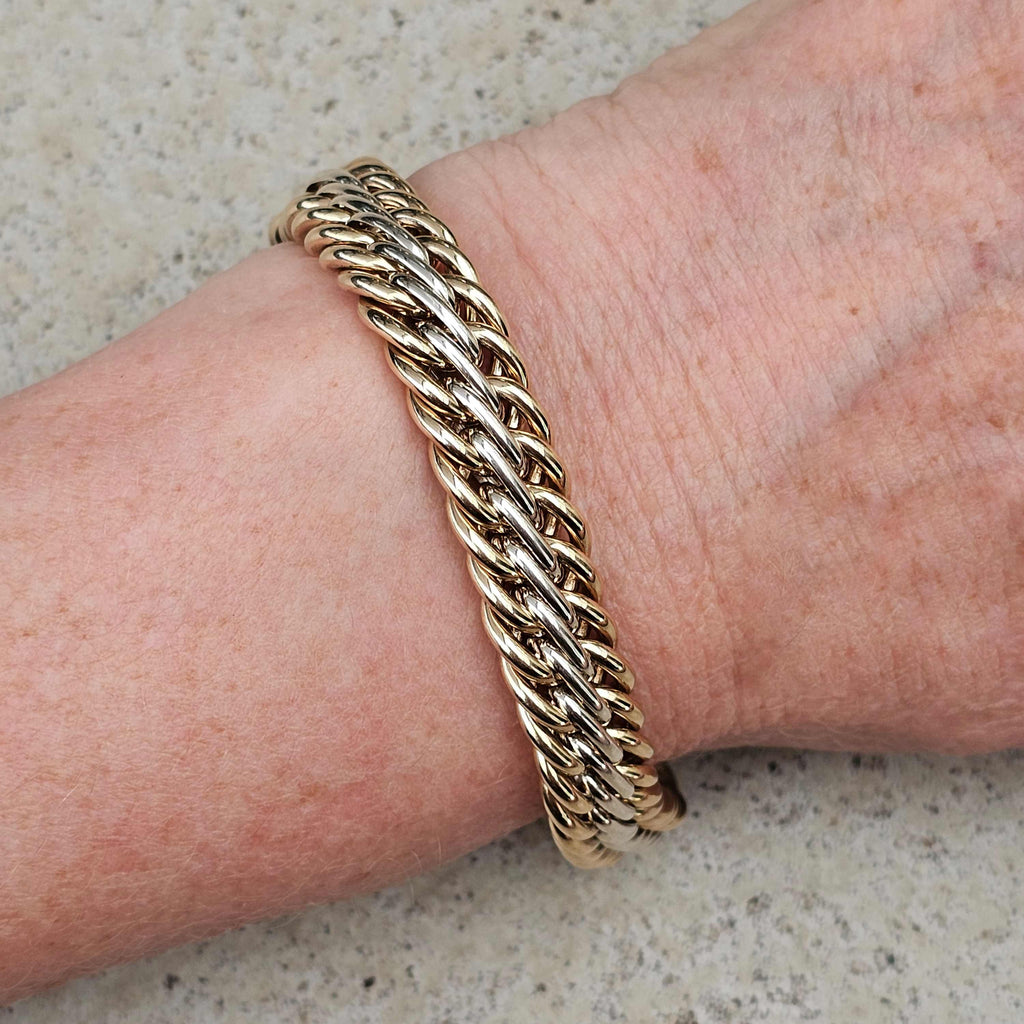 yellow and white gold handmade heavy celtic weave wheatsheaf bracelet  on wrist 