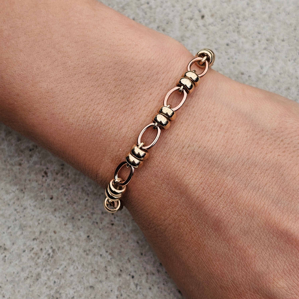 rose and yellow gold unique belcher link bracelet on wrist