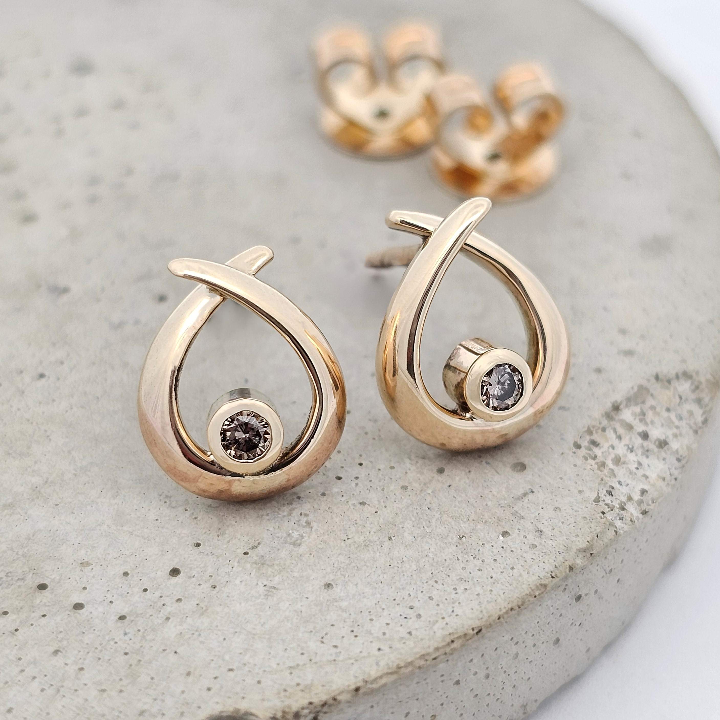 9ct yellow gold stud earrings set with champagne diamonds