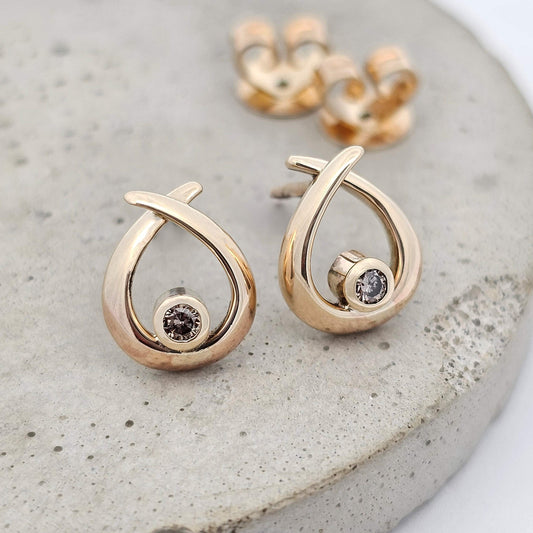 9ct yellow gold stud earrings set with champagne diamonds