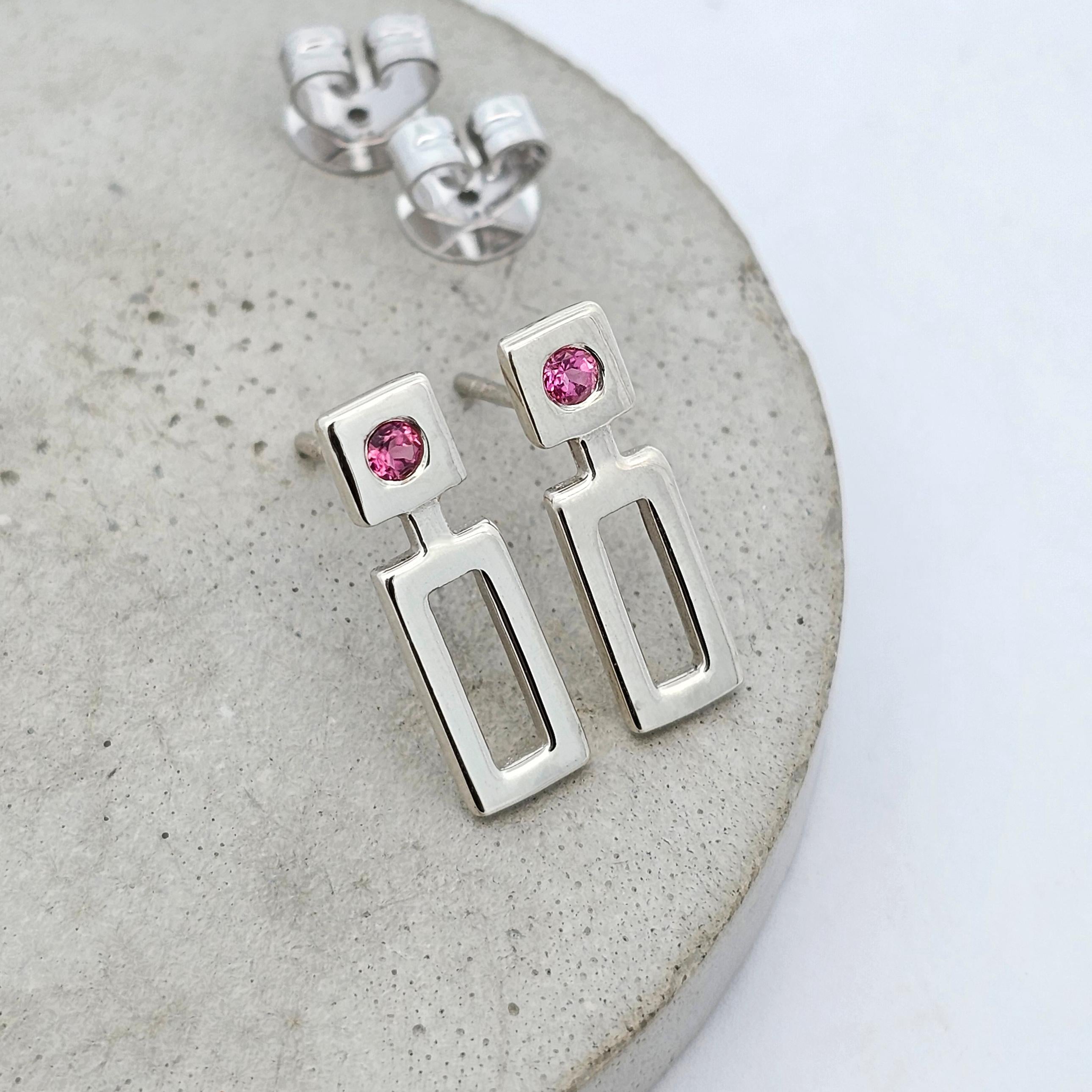 crisp white gold geometric stud drop earrings with square-set pink tourmaline gemstones 
