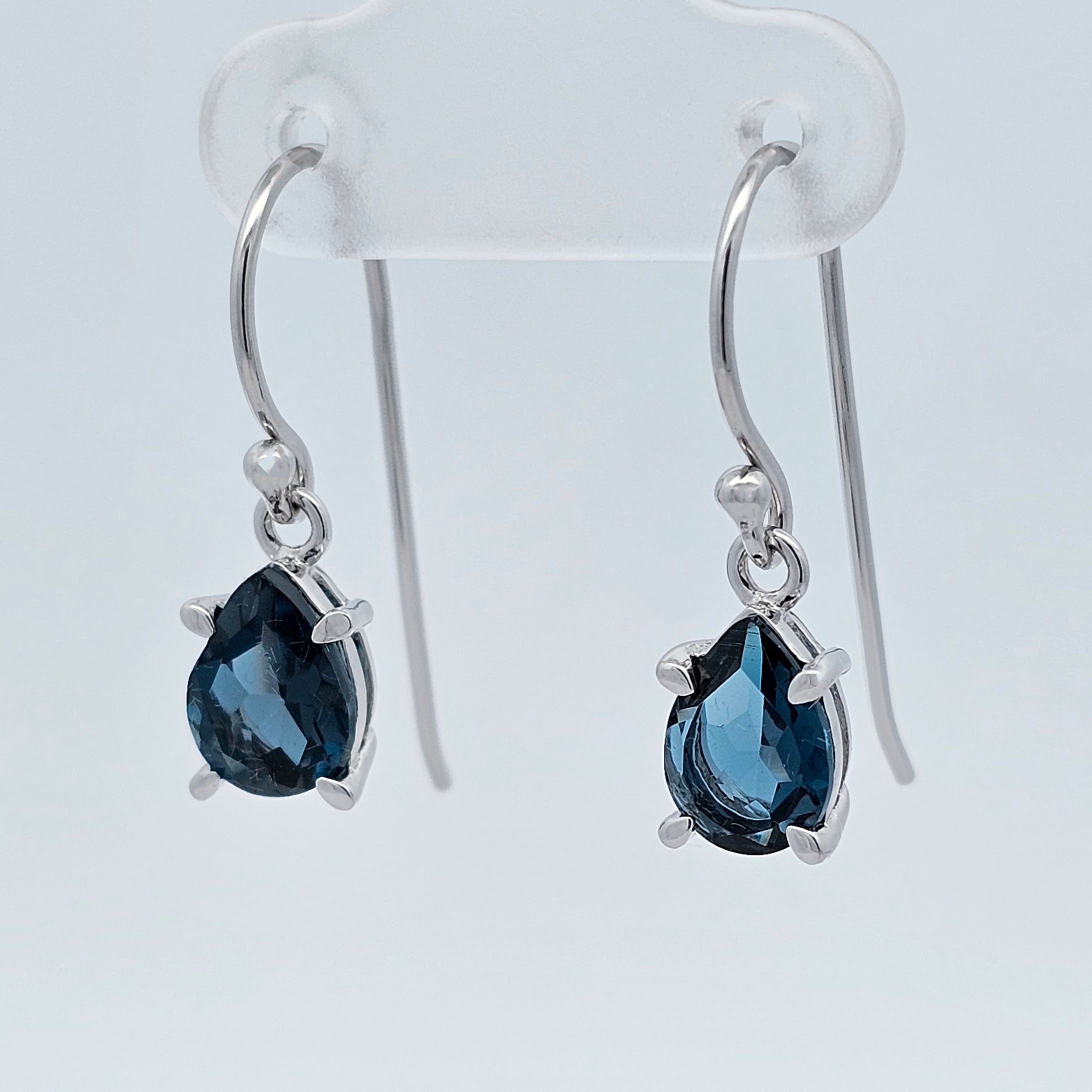 white gold pear drop london blue topaz threaded hook earrings