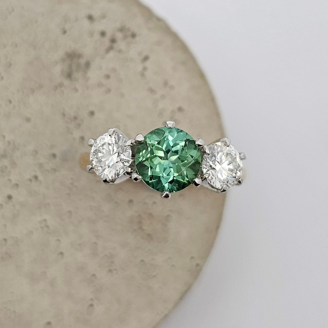 tourmaline ring; natural tourmaline ring; tourmaline three stone; three stone ring; tourmaline and diamond ring; green tourmaline; green tourmaline ring; mint green tourmaline ring; gold and tourmaline ring; claw set three stone ring; engagement ring; dress ring; green ring; October birthstone, April birthstone; October birthstone ring; april birthstone ring