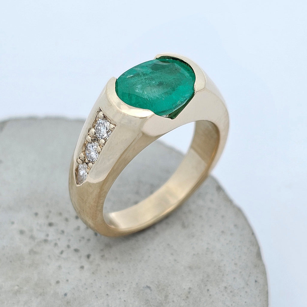 yellow gold emerald and diamond anniversary ring 