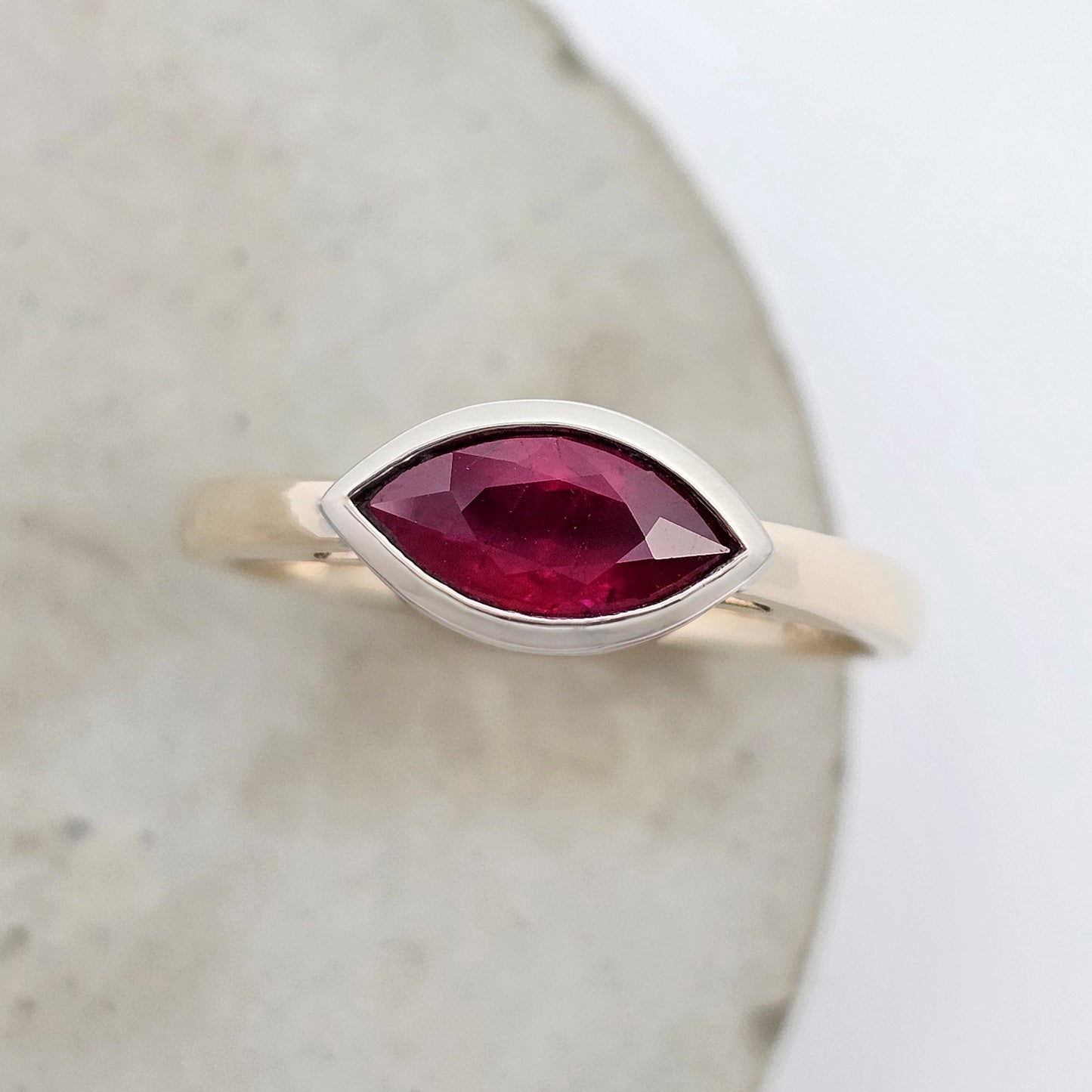 yellow and white marquise-cut Mozambique ruby set in a modern wedding anniversary engagement ring 
