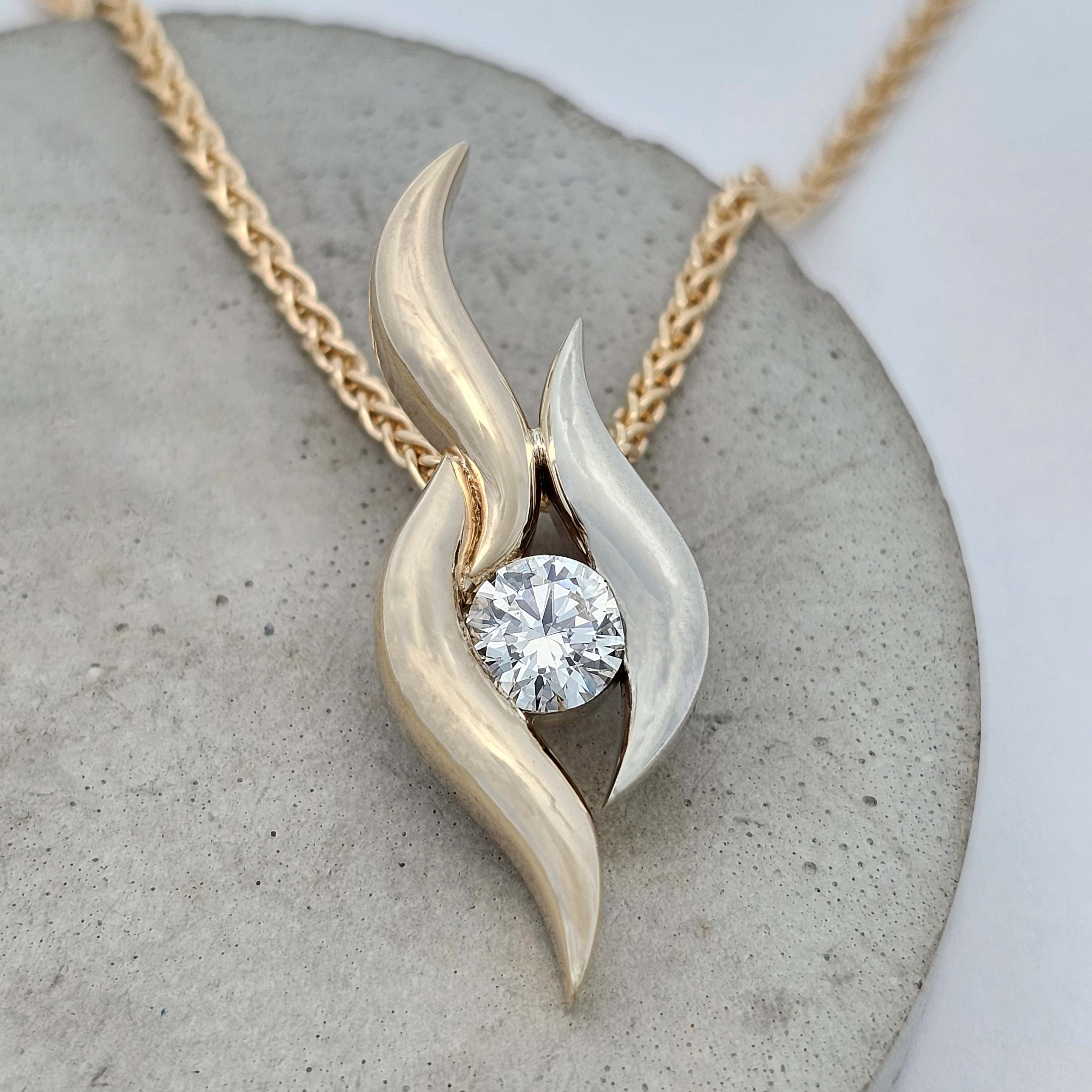 9ct yellow and white gold half carat diamond pendant 