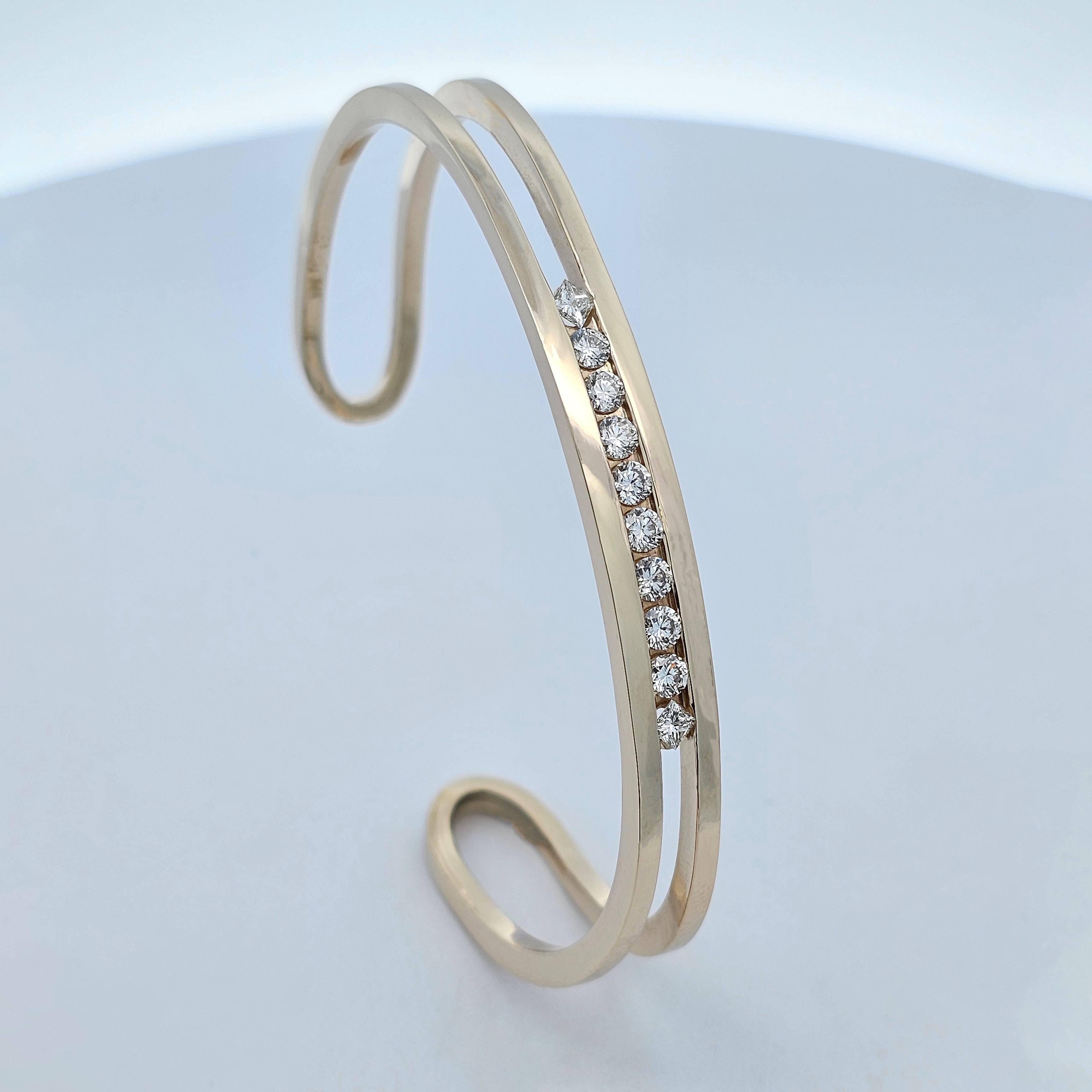 yellow gold channel set one carat diamond fitted cuff bangle 